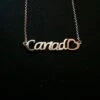 Cariad Word Sterling Silver And Rose Gold Pendant And Necklace -Handmade Gifts Shop cariad necklace rose gold welsh jewellery
