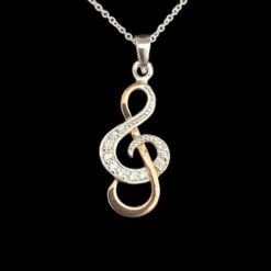 Musical Treble Clef Necklace In Silver And Rose Gold